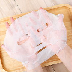 Cayanmydery DIY compressed mask soaking in water to expand and absorb nutrients.