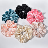 CEELGON pink satin silk scrunchie close-up with crease-free hold for thick hair