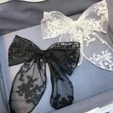 CELLIFEZY big black lace bow clip adds elegant contrast to updos.