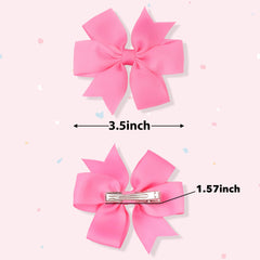 CÉLLOT grosgrain ribbon bow with secure clip for all-day styling.