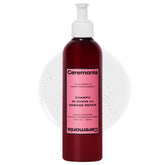 Ceremonia Guava Protect & Repair Shampoo bottle pouring for gentle cleansing.