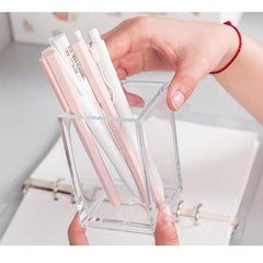 Cerpourt acrylic desk organizer neatly holds pens, pencils, and small desk items.