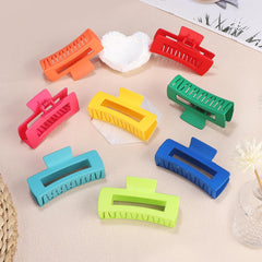 CHANDAT Dopamine 4.1-inch orange rectangle hair clip adds bold color with reliable grip.