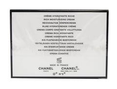 CHANEL N°5 Body Cream texture close-up reveals creamy richness for daily softness.