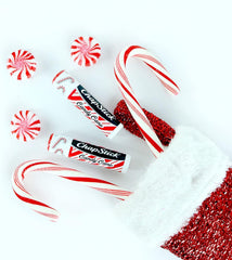 Close-up of ChapStick Candy Cane tube showing minty flavor and smooth glide.