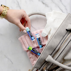 ChapStick Moisturizer 2-in-1 Cool Mint pack display outdoors