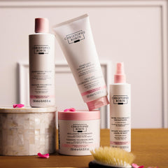 Christophe Robin Delicate Volumizing Conditioner application on hair suggests added volume and hydration