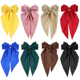 Cinaci satin big bow hair clip in turmeric for bold color accents