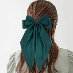 Cinaci red satin bow hair clip adds vibrant focal point
