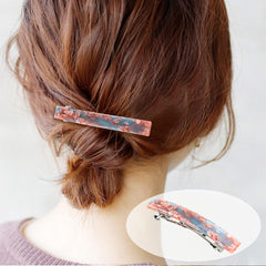 Cinaci barrette clip in royal blue provides strong grip for formal events.