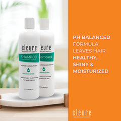 Cleure conditioner bottle side highlights fragrance-free nourishment for dry or damaged hair.