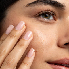 Cliganic Argan Oil being applied to hair for nourishment and shine.