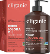 Cliganic jojoba oil 8oz pump bottle for face, skin and hair care.