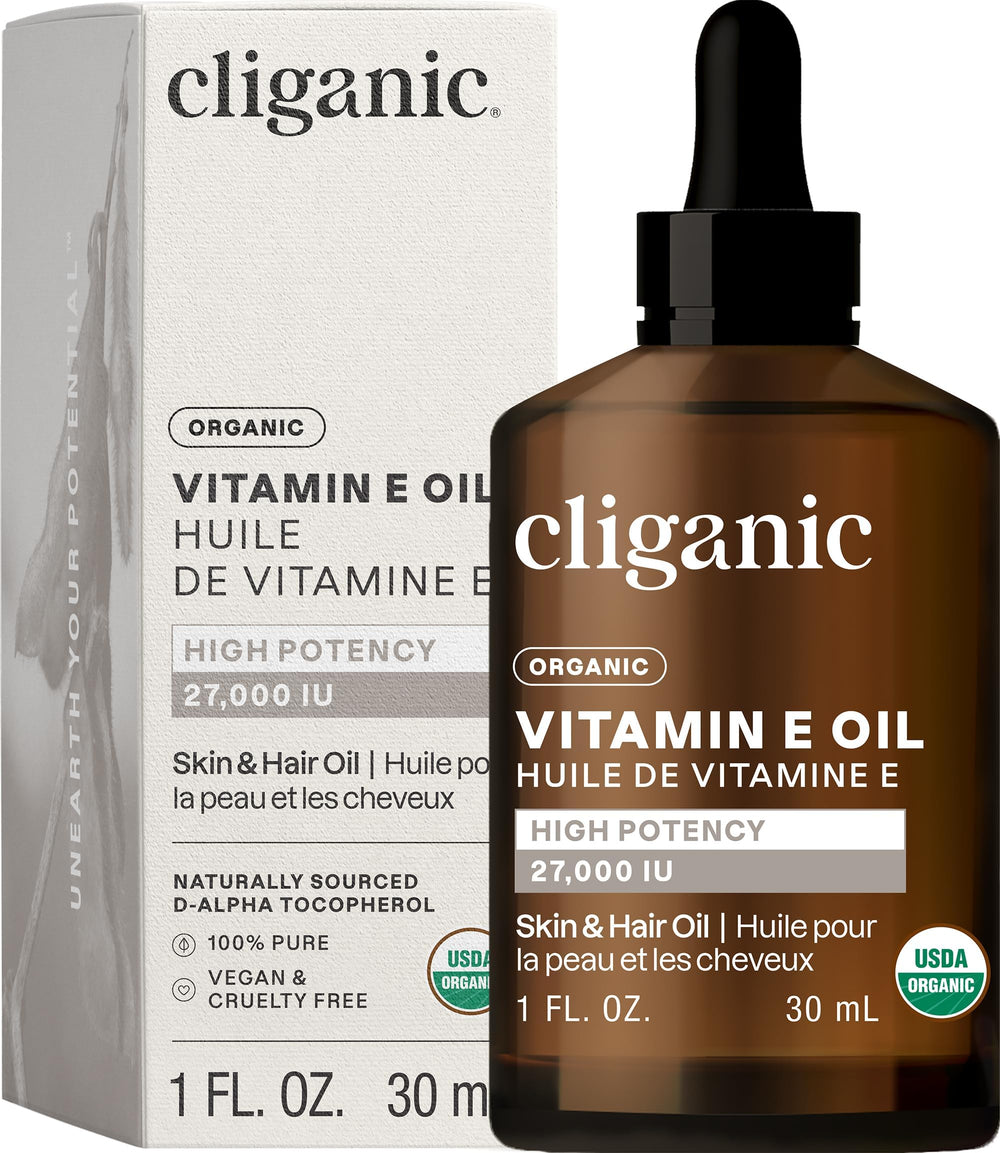 Cliganic Organic Vitamin E oil bottle closeup highlighting purity and 27,000 IU for skin care.