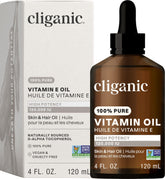 Cliganic pure vitamin E oil bottle for skin care and nourishment.