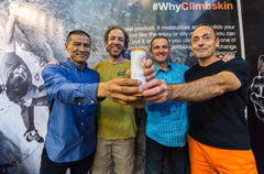 Climbskin hand cream being rubbed onto skin during a climb.