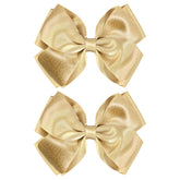 CN gold glitter hair bow clip closeup with shimmering satin finish for party-ready sparkle