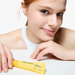 CNP Propolis Jelly Lipcerin 01 Honey Cake on lips demonstrates long-lasting gloss.