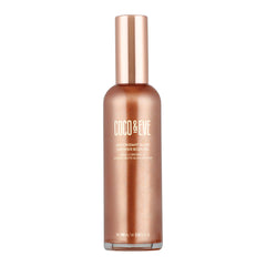 Coco & Eve Antioxidant Glow Shimmer Bottle shows radiant, non-greasy hydration.