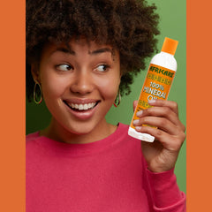 COCOCARE Africare mineral oil label close-up shows fragrance-free formula