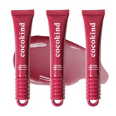Cocokind Ceramide Lip Blur Balm Be Bold Burgundy tube close-up for glossy hydration
