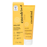 Cocokind Daily SPF front label highlights fragrance-free formula for sensitive skin protection.