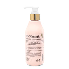 Cocomagic Defining Curl Cream bottle angle shows creamy texture for smooth styling.