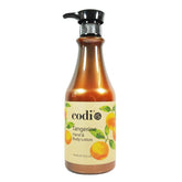 Codi Tangerine hand and body lotion bottle offering daily moisture and light citrus scent.