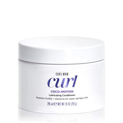 COLOR WOW Curl Wow Coco-motion conditioner bottle close-up for smooth detangling.