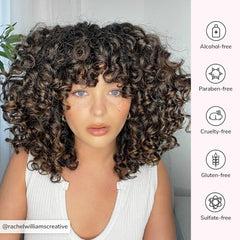 COLOR WOW Dream Coat Curly Hair product shot highlights portable 2.5 fl oz bottle.