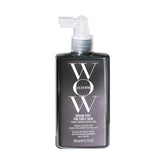 COLOR WOW Dream Coat curly hair bottle showing frizz-free, defined curls.