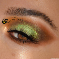 ColourPop Winnie the Pooh Sweet As Can Bee metallic shade swatch shows luminous finish.