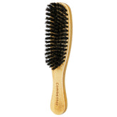 Combetter boar-bristle slick back brush with wooden handle for smooth styling and frizz reduction.