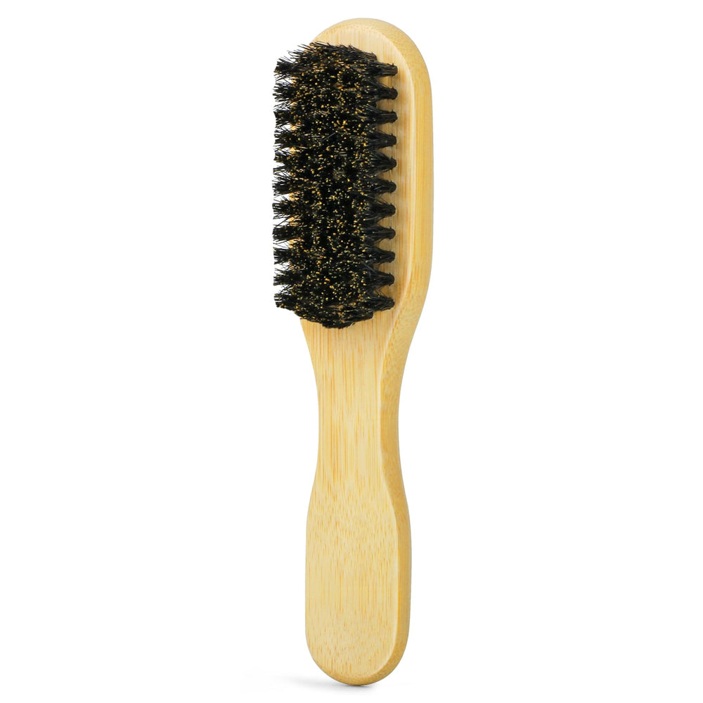 Combetter Slick Back Brush front view showing compact travel-friendly design for styling