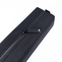 Comfyable Dopp kit with water-resistant material protecting electronics and liquids.