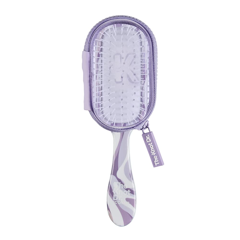 Conair Knot Dr. travel brush purple outside case for on-the-go detangling.