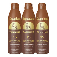 Coppertone Tanning Sunscreen Spray bottle front shows quick SPF 15 coverage for outdoor days.