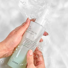 COSRX Pure Fit Cica Cleansing Oil pump shows lightweight texture for easy makeup removal.