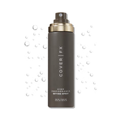 Cover FX setting spray bottle closeup demonstrates all-day makeup hold.