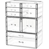 Cq acrylic clear 9-drawer setup for cosmetics on a vanity.