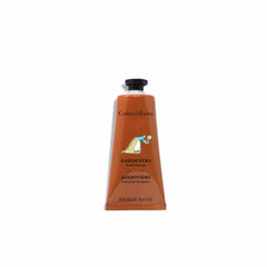 Crabtree & Evelyn Gardeners Hand Therapy on dresser suggests daily care for hardworking hands.