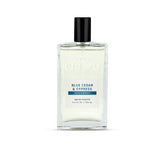 Cremo Blue Cedar & Cypress bottle-front view showing woodsy fragrance for daily wear