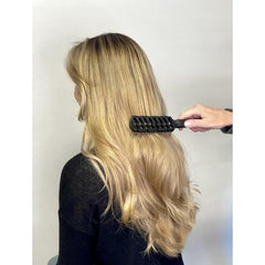 Cricket Static Free Fast Flo Flex Head in use follows scalp contours for comfortable detangling.