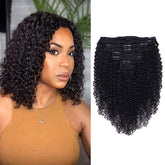Croocco Curly Clip-In Extension closeup showing Brazilian Remy hair for natural blend.