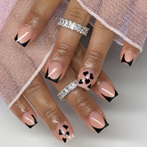CTTHNBD short press-on nails square with black French tip and heart design for chic occasions