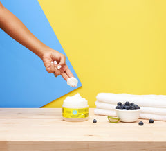 Curls Blueberry Bliss application scene: massage into scalp to restore moisture.