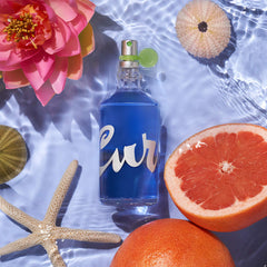 Curve Eau De Toilette cap close-up highlights compact travel-friendly size.