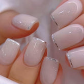 Curvlife press-on nails in ivory silvery white with a natural gel finish for daily wear.