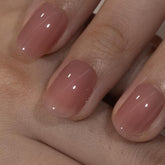 Curvlife soft gel press-on nails honey peach pink closeup demonstrates salon-like finish.