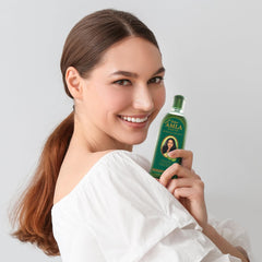 Dabur Amla Hair Oil glow on hair after use adds shine.